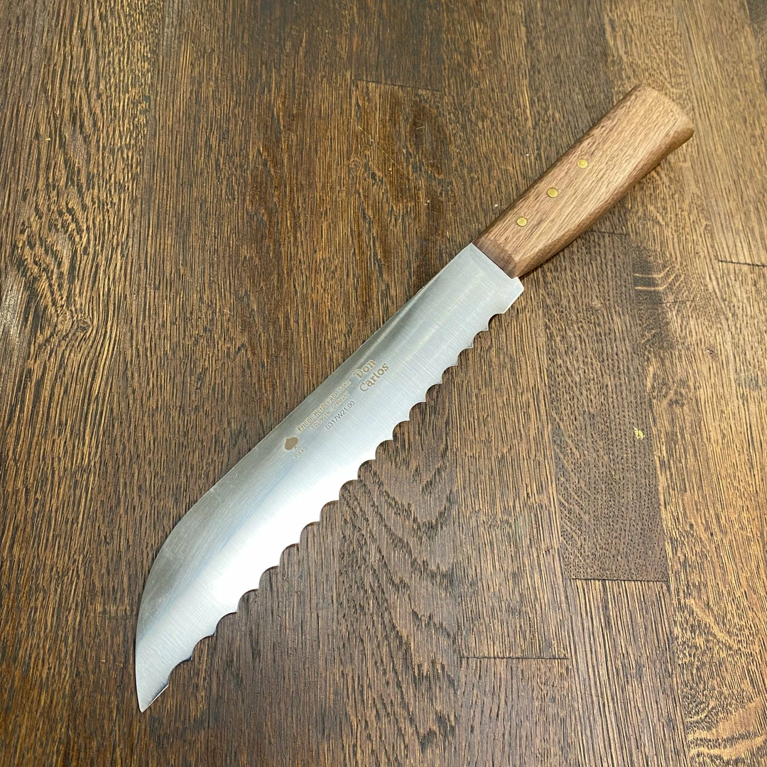 Friedr. Herder Friedr Herder 8โ Serrated Boscher Knife Carbon Steel Walnut