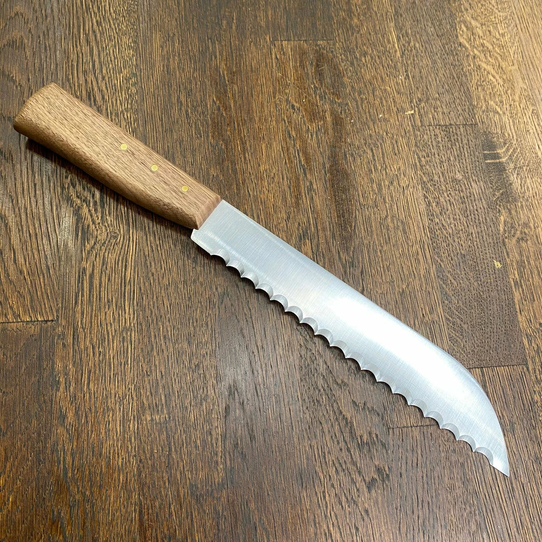 Friedr. Herder Friedr Herder 8โ Serrated Boscher Knife Carbon Steel Walnut