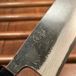 H&K Kumokage 180mm Santoku Aogami 2 Kurouchi Carbon Damascus Oct Teak Horn Hatsukokoro